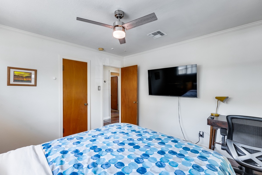 The secondary bedroom offers the same refined comfort as the other rooms.