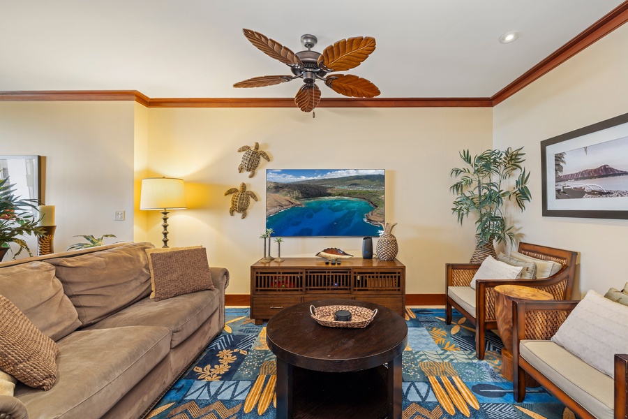 Relax in your tropical living room with island-inspired décor, comfortable seating, and entertainment center for cozy evenings.