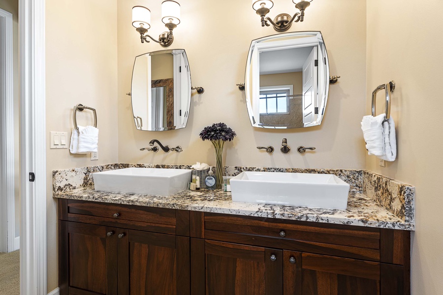 Upstairs guest bathroom with dual vanities