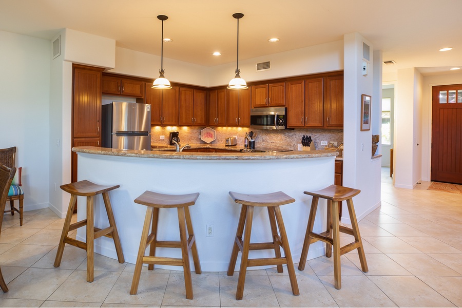 The kitchen has room for cooking or simply enjoying company