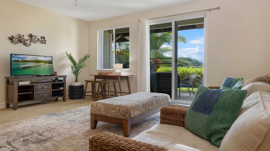Step seamlessly from the bright living space to the shaded lanai—perfect for lounging or dining alfresco with a view.