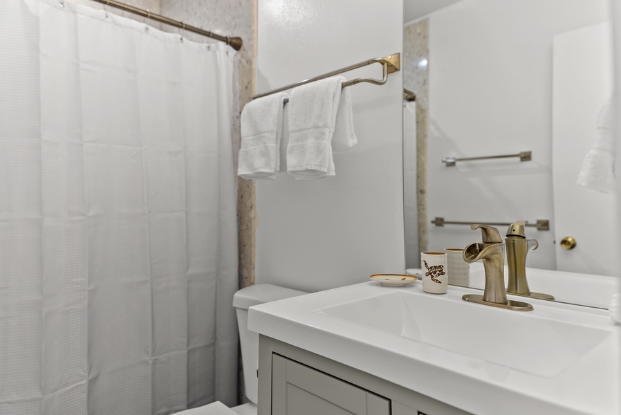 Full size shower in upstairs bathroom.