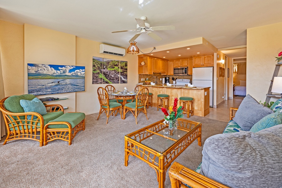 The living and dining area flow seamlessly into the kitchen, creating a welcoming space for meals and relaxation with family and friends.