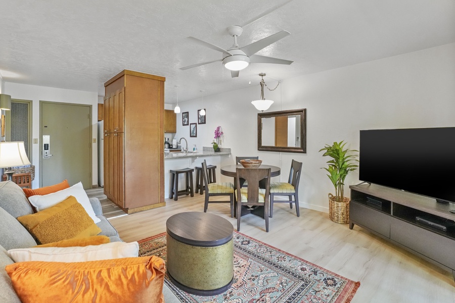 The fully open floor plan seamlessly connects the living, dining, and kitchen areas—perfect for couples or small families to relax and reconnect.