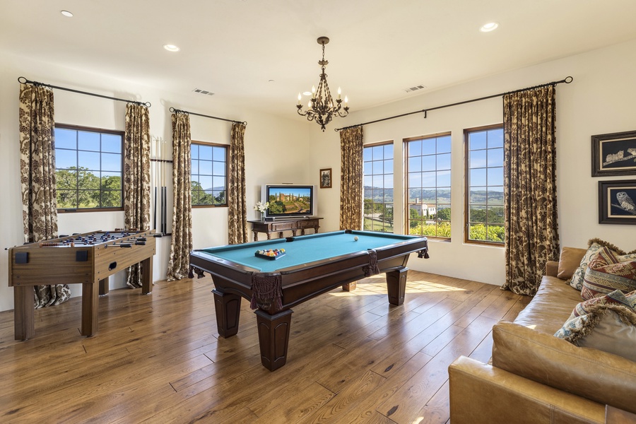 Villa Capricho also features a game room complete with a game console, foosball table, and billiards table