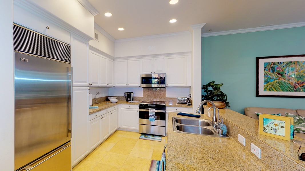 The bright kitchen has plenty of counter space for all meal prep.