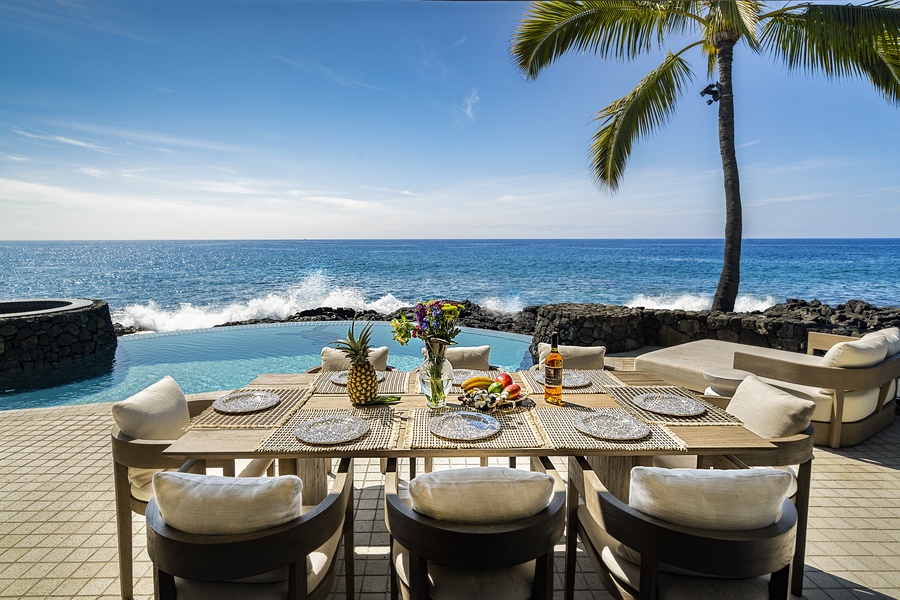Dine outdoors with the symphony of the ocean crashing along the shoreline