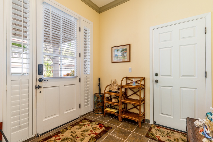 Keep beach gear and shoes organized with this inviting entrance area—function meets island flair.