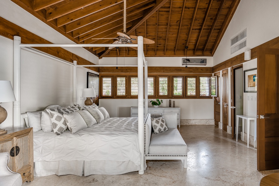The suite features high vaulted ceiling and split AC.