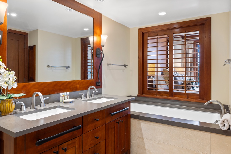 Soak your cares away in the bathtub of the primary guest bathroom.