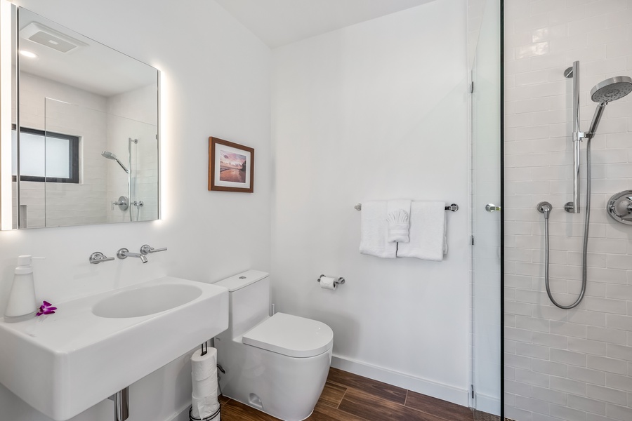 Mauka South ensuite bath with walk-in shower and single sink