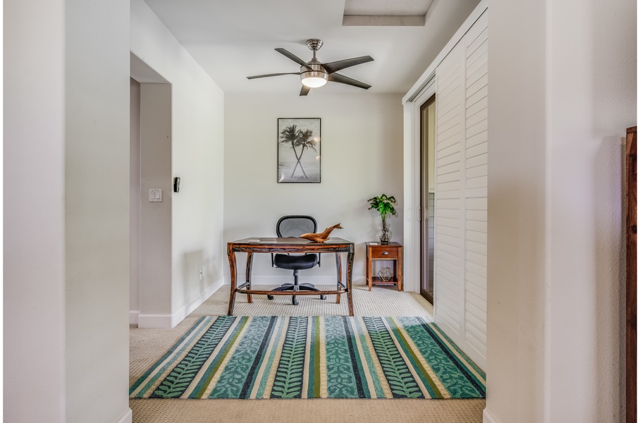 The primary bedroom work station has direct access to the patio