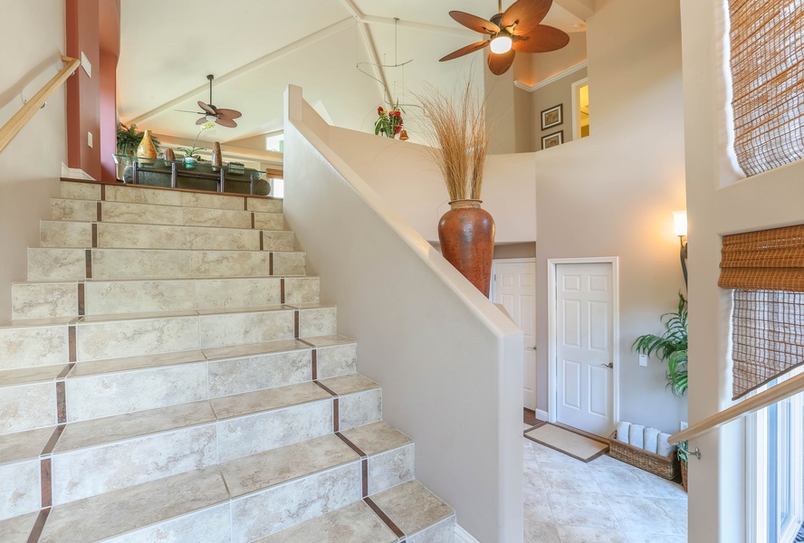 Living Area ,Kitchen and Guest Bedroom on the upper level. Bedrooms Suites on the lower level.