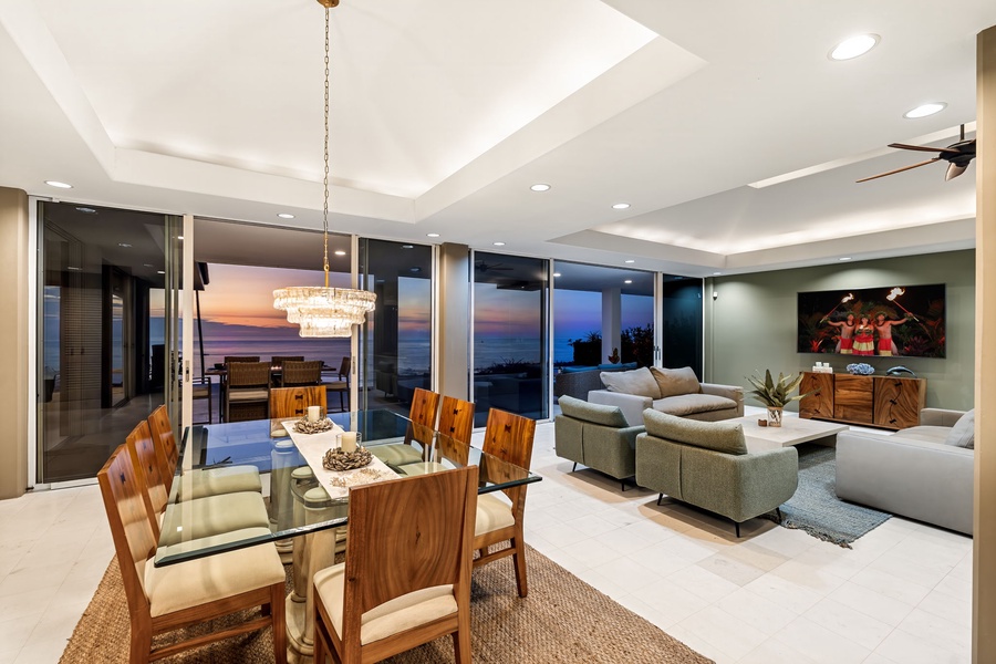 Unwind in this stunning open-concept space where floor-to-ceiling windows frame breathtaking ocean views, creating the perfect backdrop for your memorable stay.