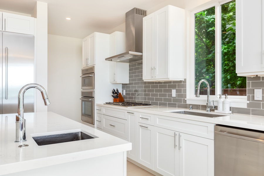 Galley-style kitchen with clean lines, natural light, and ample storage space.