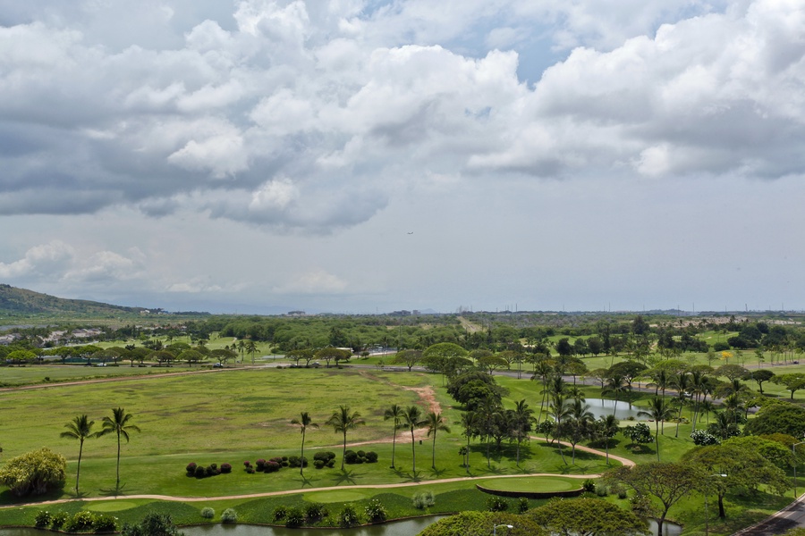The golf course with lush green landscaping.