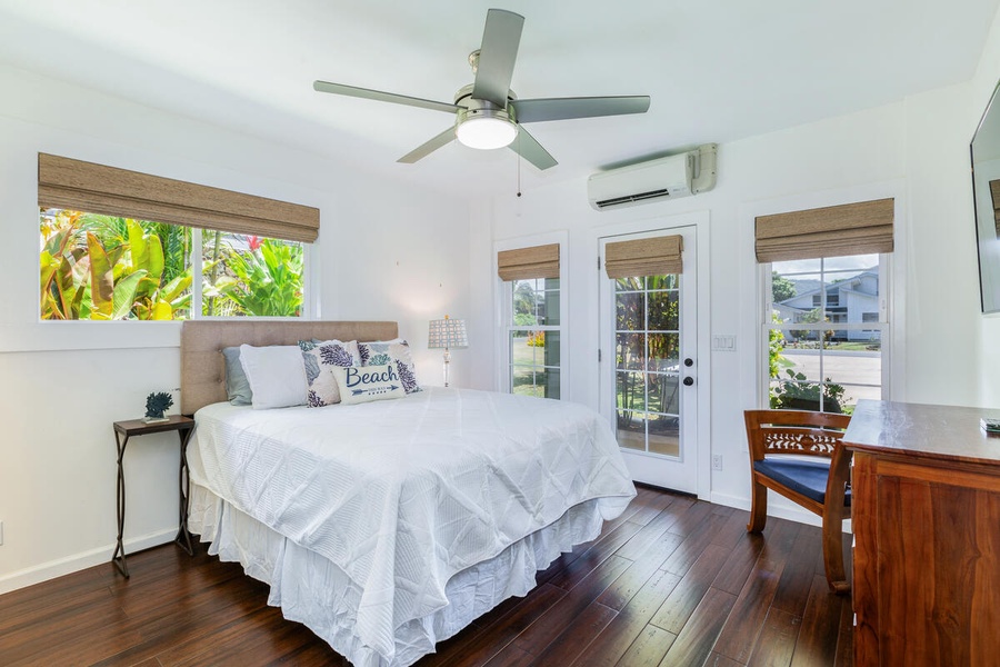 The guest bedroom three has a full-sized bed, split AC, and ceiling fan.