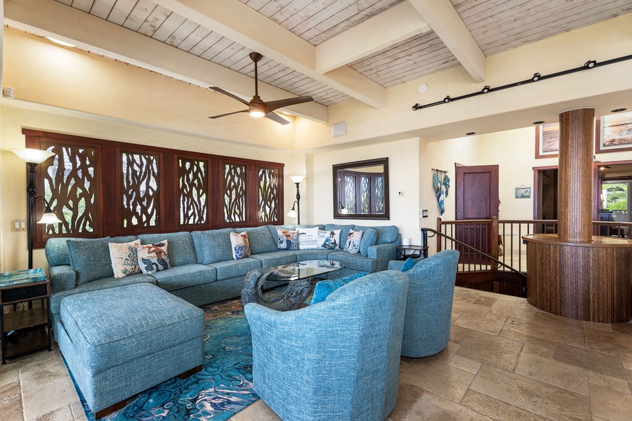 Comfortable lounge area with a large sectional and swivel chairs