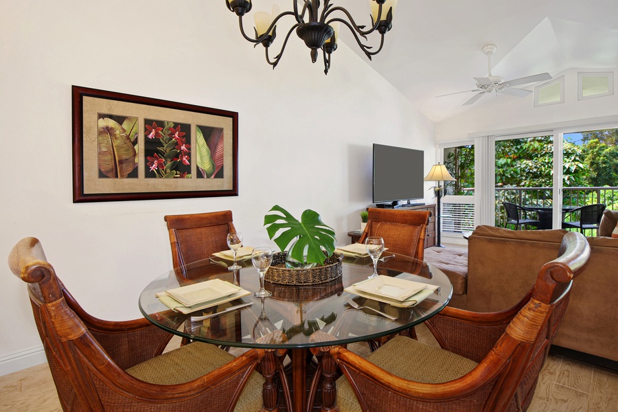 Dining area with seating for four and lovely views to enhance your meals.