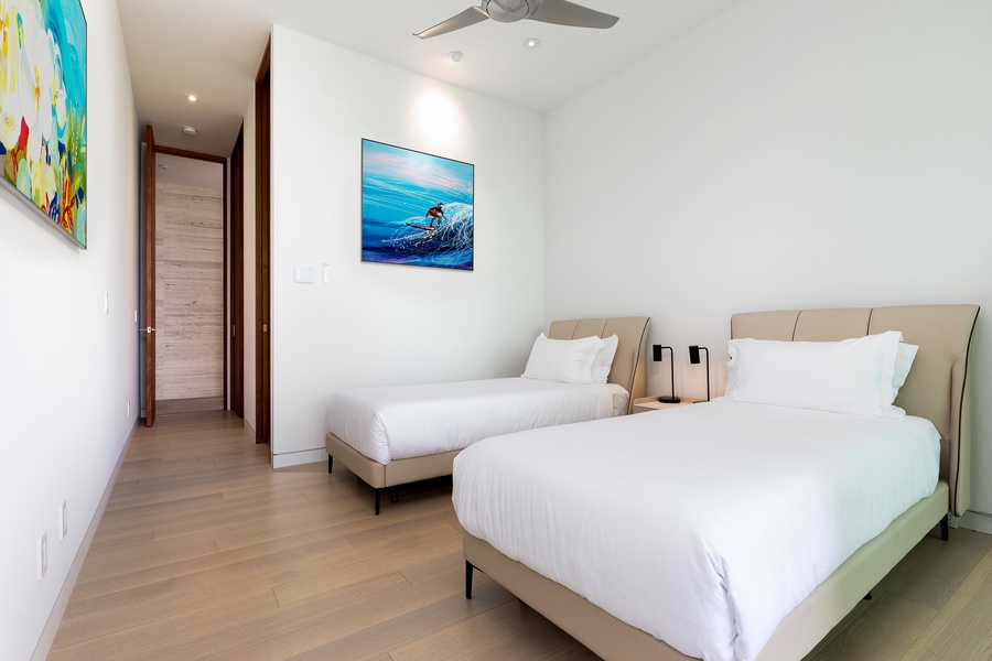 Second bedroom offers comfort with its clean lines and natural light, for a restful sleep.