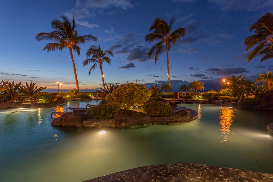 View of another portion of the pool at twilight.