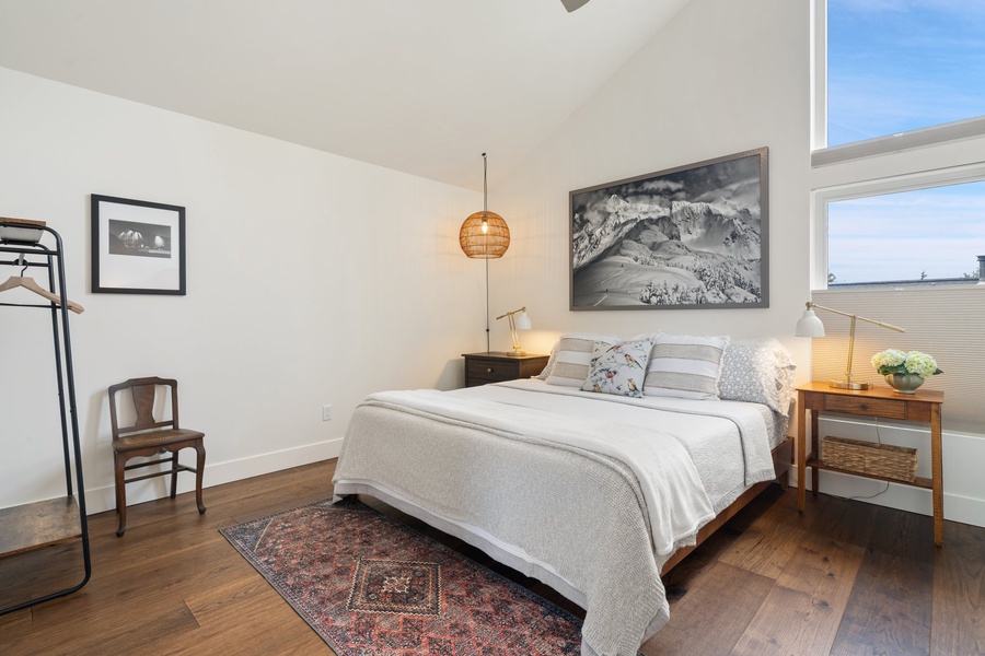 The Shuksan Suite offers a Cal King bed, soft textures, and serene Fairhaven light.