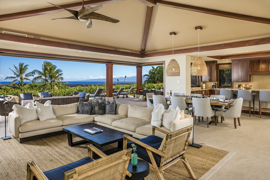 Open floor plan great room steps out to lanai, barbecue area, pool and spa through floor to ceiling pocket doors.