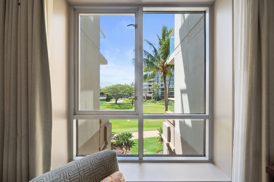Enjoy peek-a-boo ocean views from your cozy reading nook at Honua Kai Konea 204.