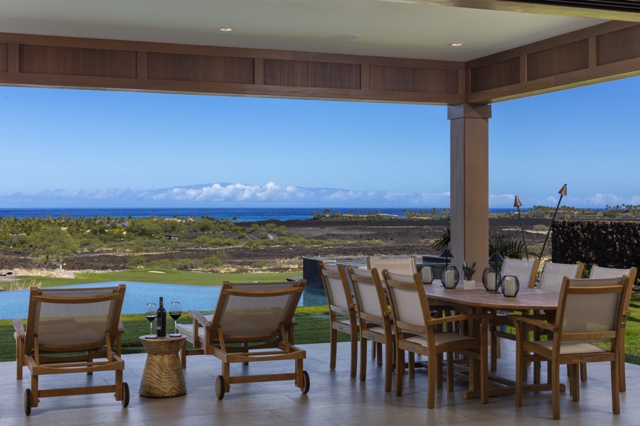 Panoramic views from the lanai with plentiful dining and lounging spaces.