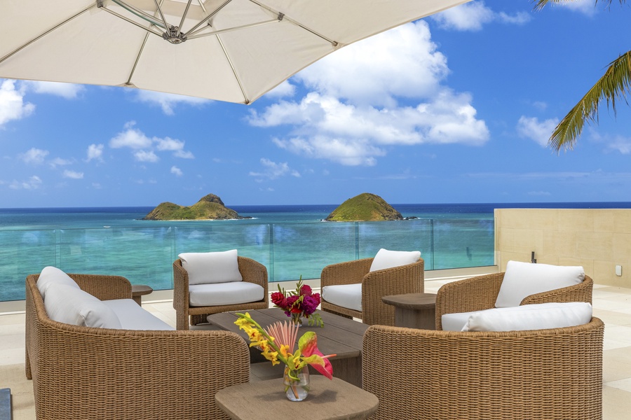 Guest bedrooms shared lanai, offering serene mountain views and a peaceful retreat.