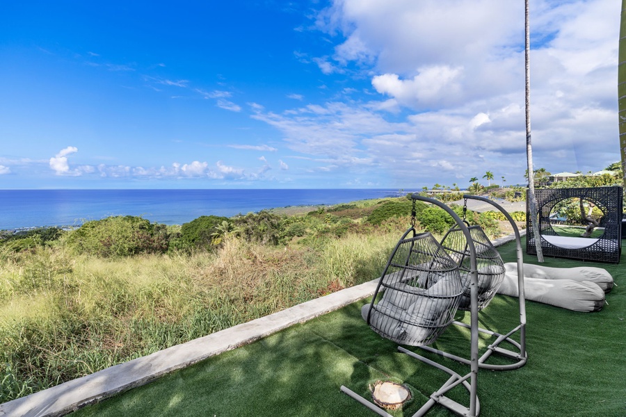 Swing gently in your private hanging chair while soaking up breathtaking ocean views and tropical breezes from your terrace.