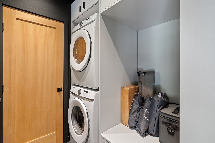 Equipped with a washer and a dryer and other laundry tools. A functional space designed to keep your stay fresh and worry-free.