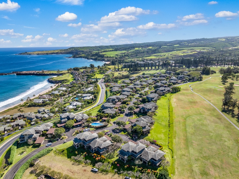 This aerial view of Kapalua Ridge 2321 shows sweeping golf course and oceanfront vistas.