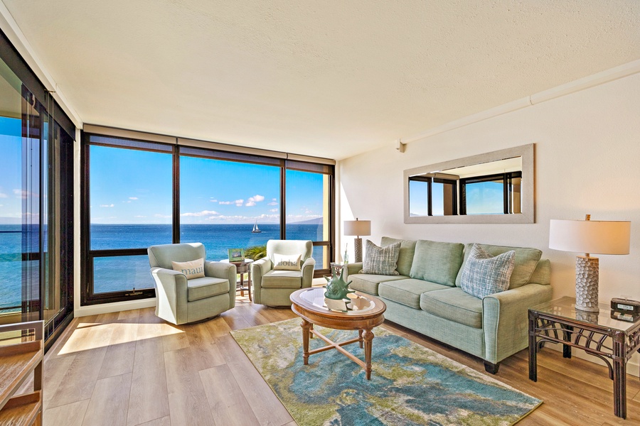 Relax in Mahana 718’s cozy oceanfront living room with panoramic Maui views.