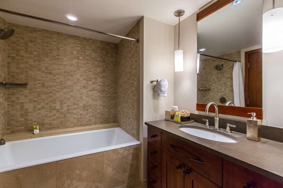 The second bedroom ensuite features a large soaking tub