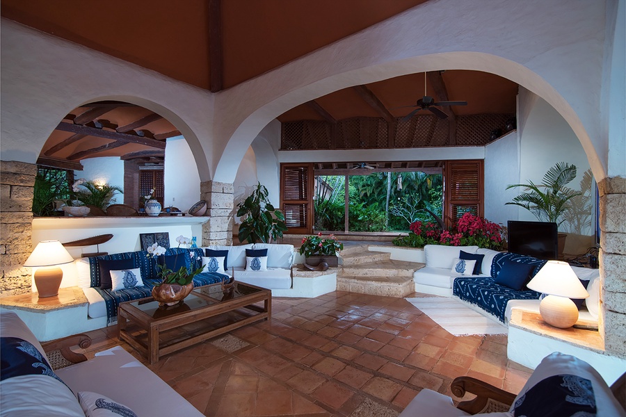 Cozy lounge area with access to the tropical garden.