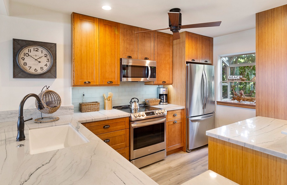 Enjoy preparing meals in this bright and airy kitchen, complete with ample counter space.