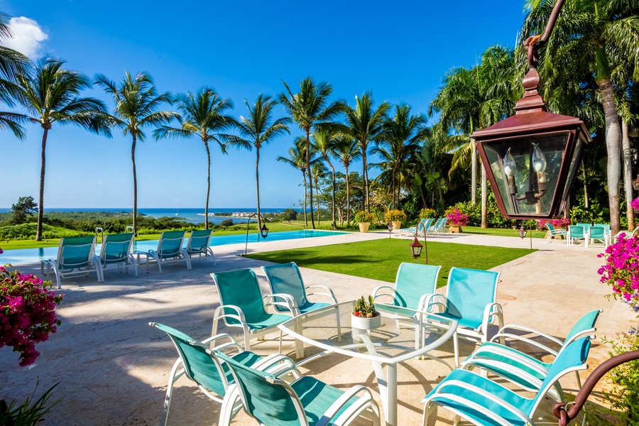 Enjoy poolside relaxation with a cool drink.