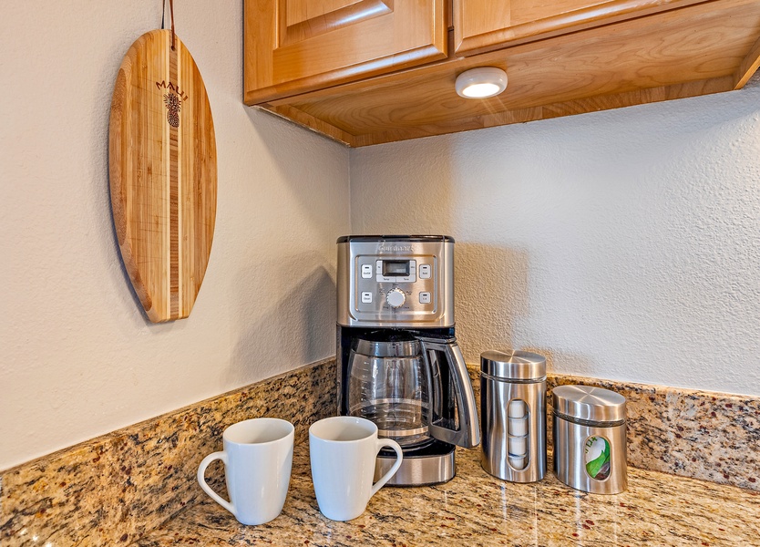 Start your day with a fresh cup of coffee, conveniently prepared in the well-equipped kitchen.