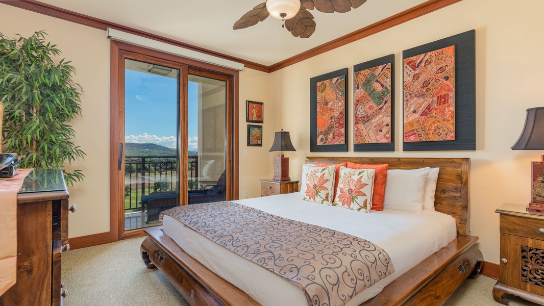 The primary bedroom is spacious and has bright blue sky views.