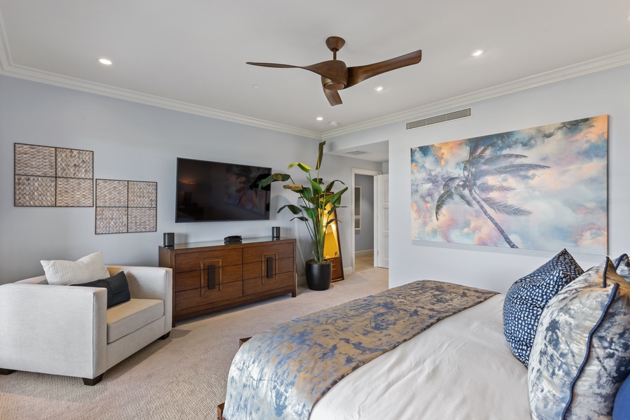 Relax in the serene primary suite at Wailea Luxury Residence Hoolei 23-3, styled with tropical touches.