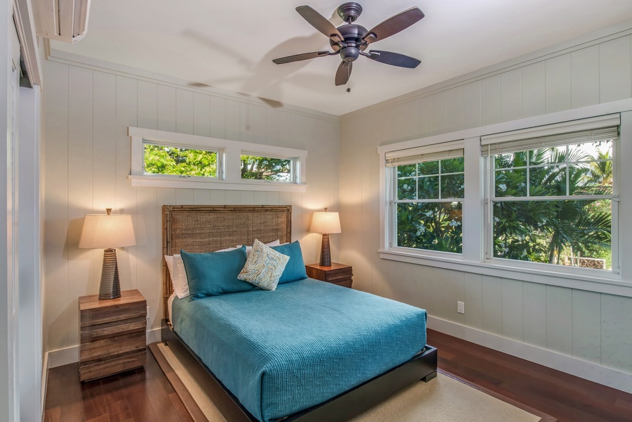 Ohana Guest Cottage Bedroom with Queen Size Bed, Split Air-Conditioning, Flat Screen Smart TV, Garden & Ocean Views, Ensuite Bath.