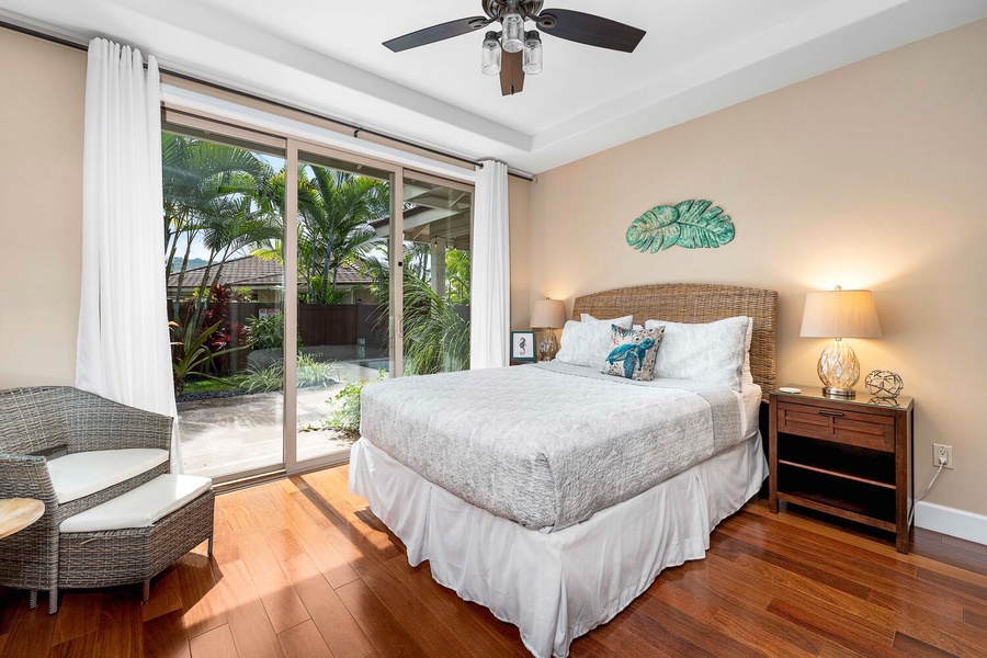 The third guest bedroom with queen bed, ensuite bathroom and private lanai.
