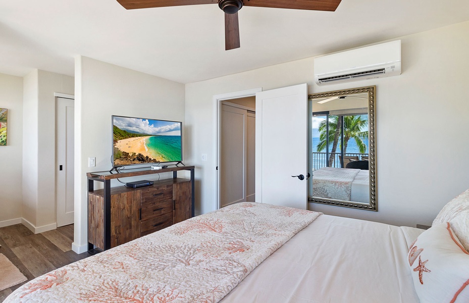 Wake up to soothing ocean views from the comfort of a cozy Primary bedroom.