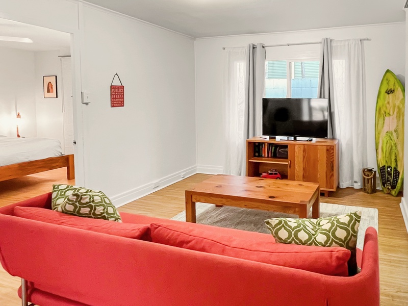 The guest cottage living room has a sleeper sofa for extra sleeping options.