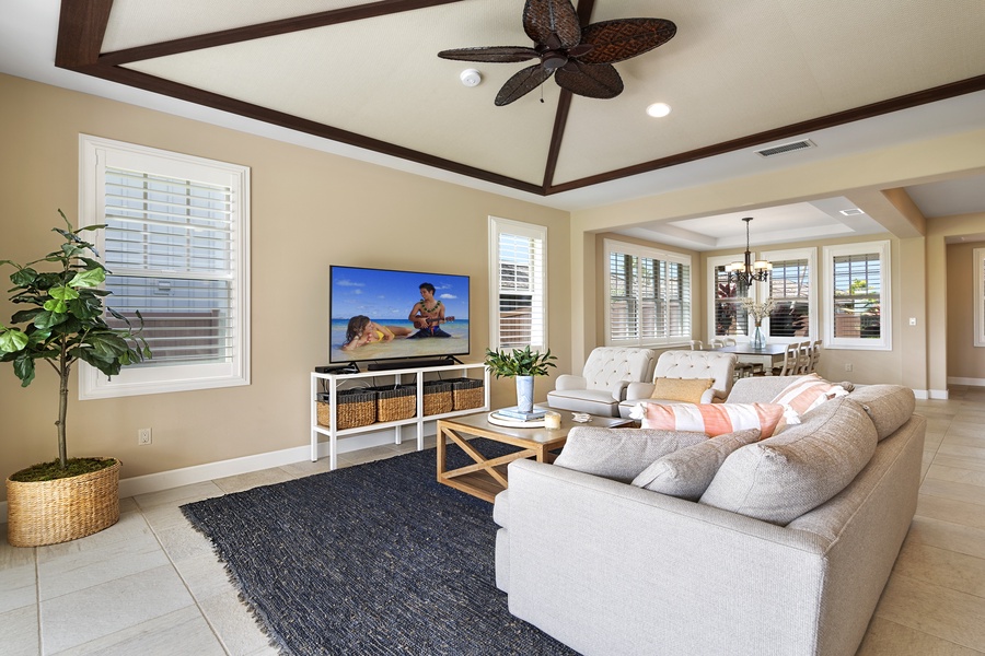 Living area with plush sofas and TV for a cozy entertainment.