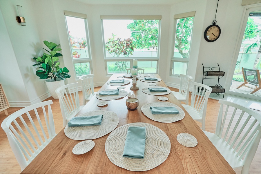 Beautifully set dining table where morning coffee and evening meals become cherished memories with garden views.