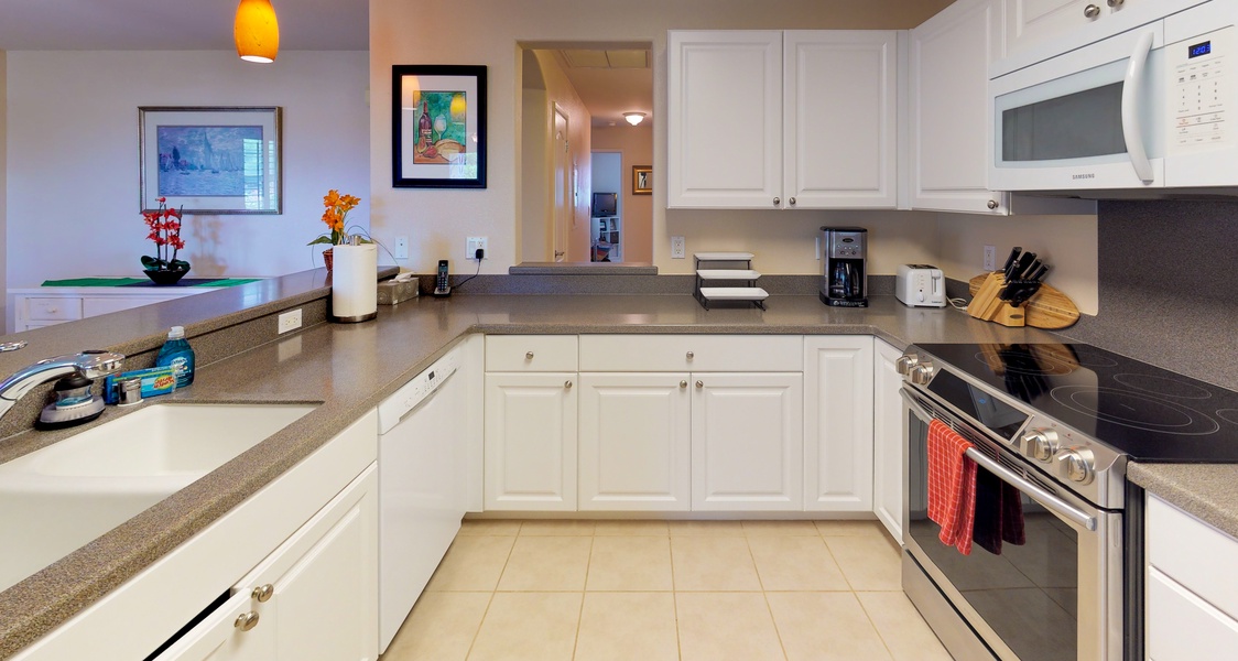 The fully equipped kitchen is ready for your culinary adventures.