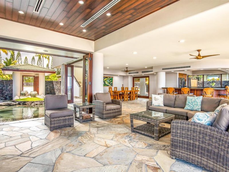 Expansive tiled living room with open sightlines