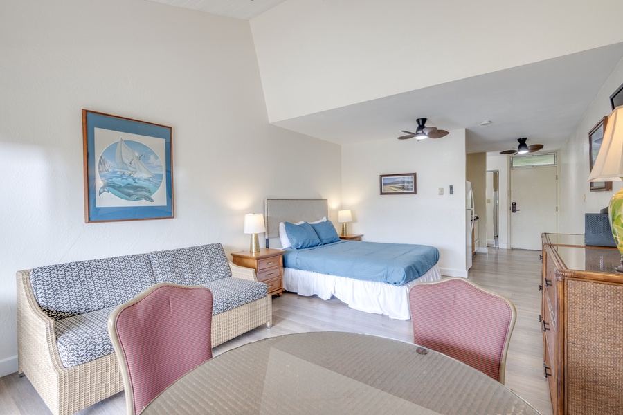 Ocean-themed décor, comfy seating area, and coastal charm throughout.